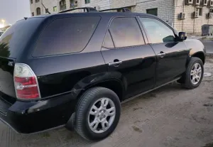 2004 اكورا ام دي اكس