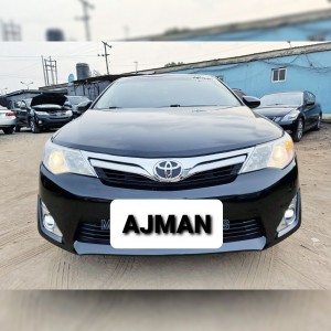 Toyota Camry 2014 American specs  Dark Metallic Grey Color. Location Ajman. 4 Cylinder in Excellent condition,  Engine, Gear and Chassis Guranteed. Call or What's App 0554400750.